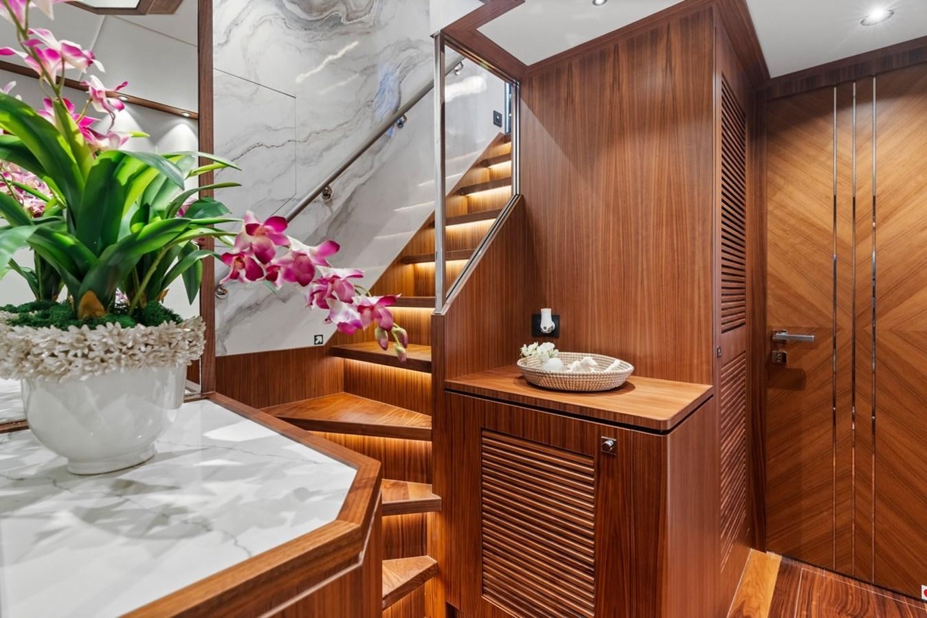 a wooden bathroom with a sink and a mirror aboard JEMILY II Yacht for Sale