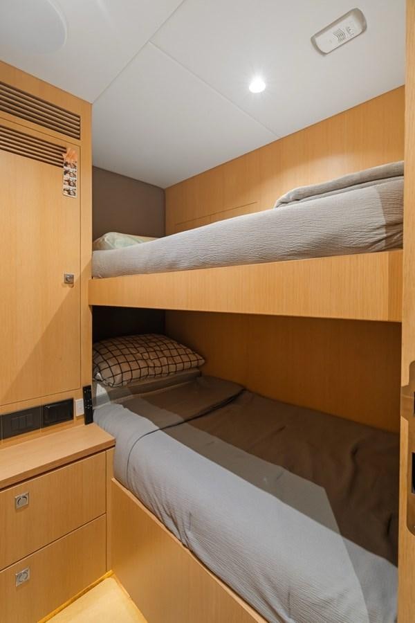 bunk beds in a room aboard JEMILY II Yacht for Sale