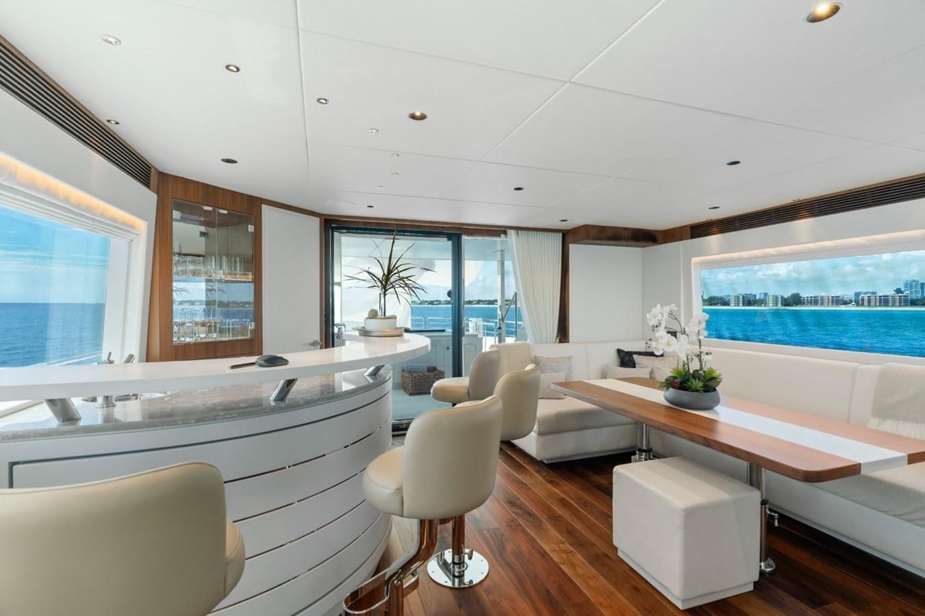 a modern looking kitchen with a large window aboard JEMILY II Yacht for Sale
