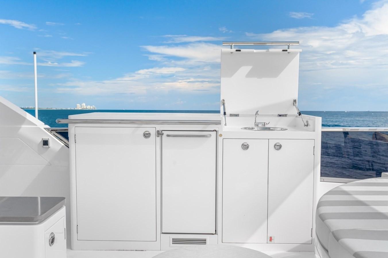 a group of white cabinets on a boat aboard JEMILY II Yacht for Sale