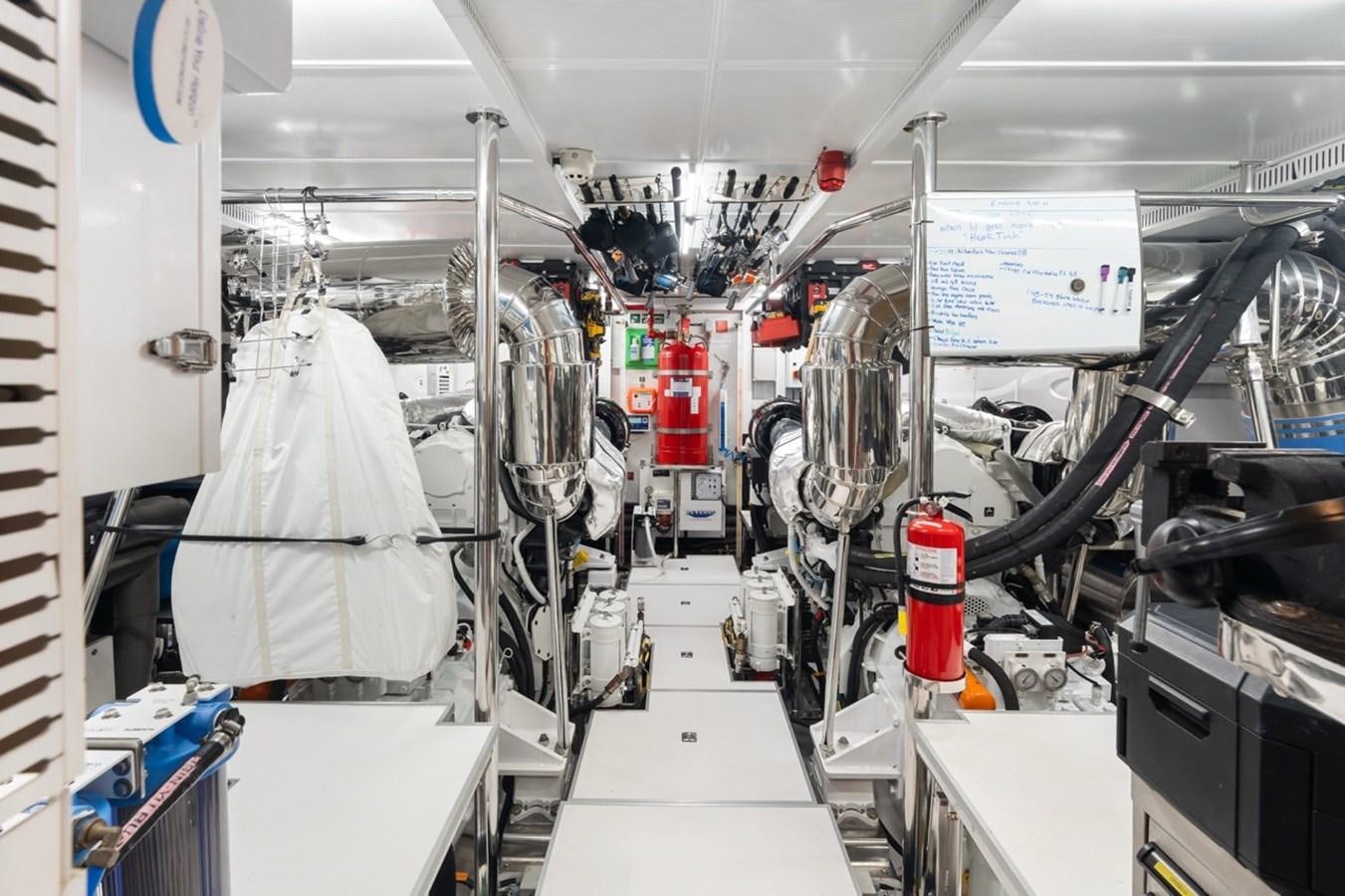 a room with machinery and a screen aboard JEMILY II Yacht for Sale
