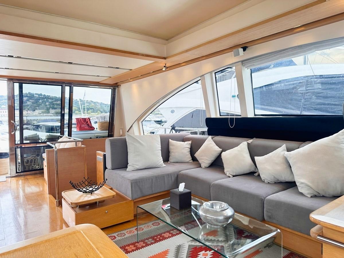 a living room with a large window aboard MEMORY Yacht for Sale