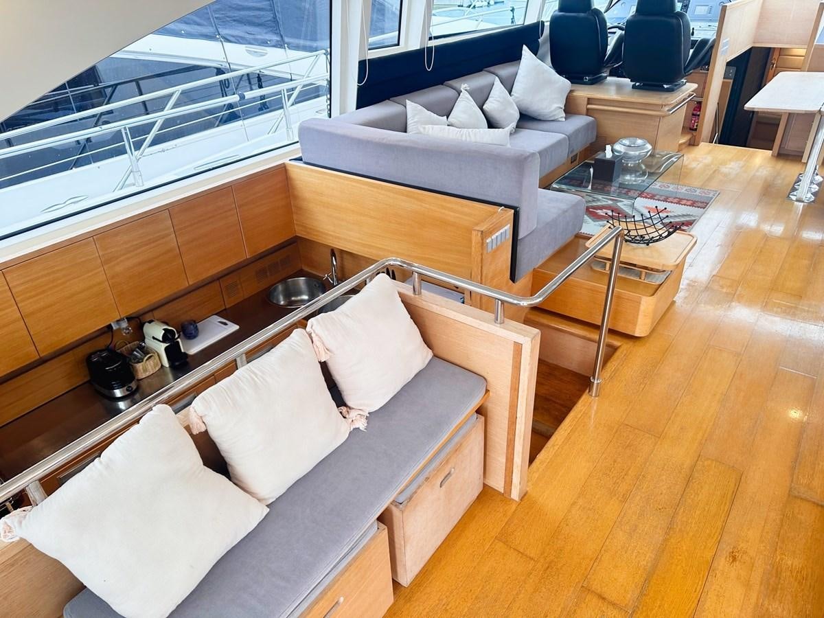 a living room with a large bed aboard MEMORY Yacht for Sale