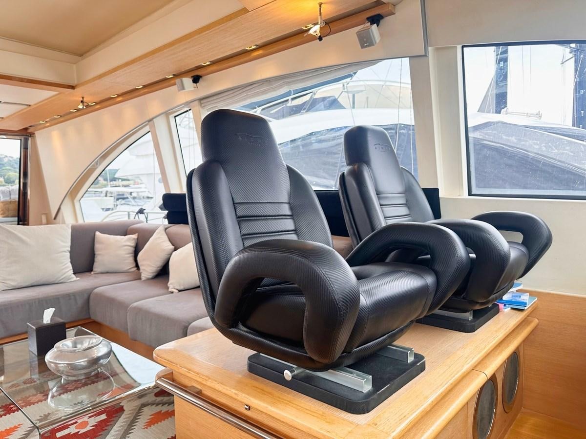 a leather chair in a room aboard MEMORY Yacht for Sale