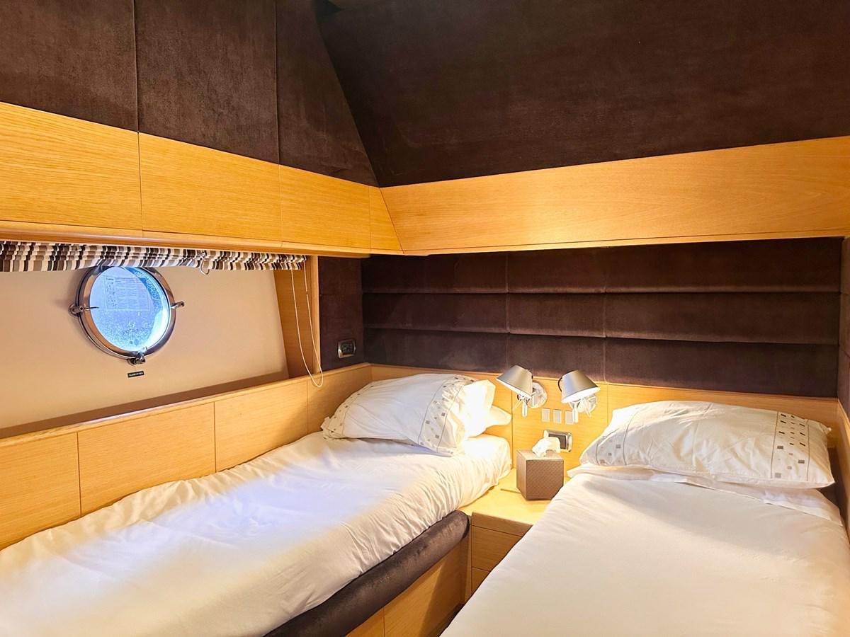 a room with two beds aboard MEMORY Yacht for Sale