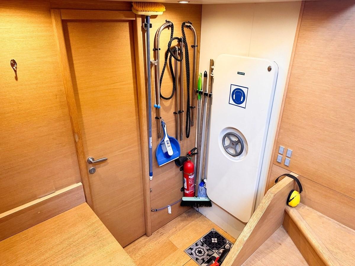 a small refrigerator in a room aboard MEMORY Yacht for Sale