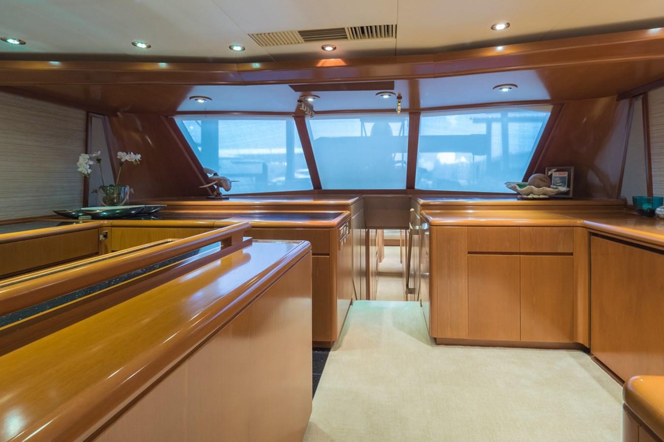 a room with a desk and chairs aboard THANKS BUDS Yacht for Sale