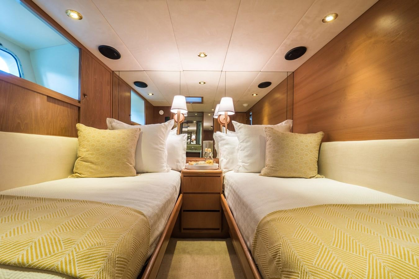 a room with a bed and a table aboard THANKS BUDS Yacht for Sale