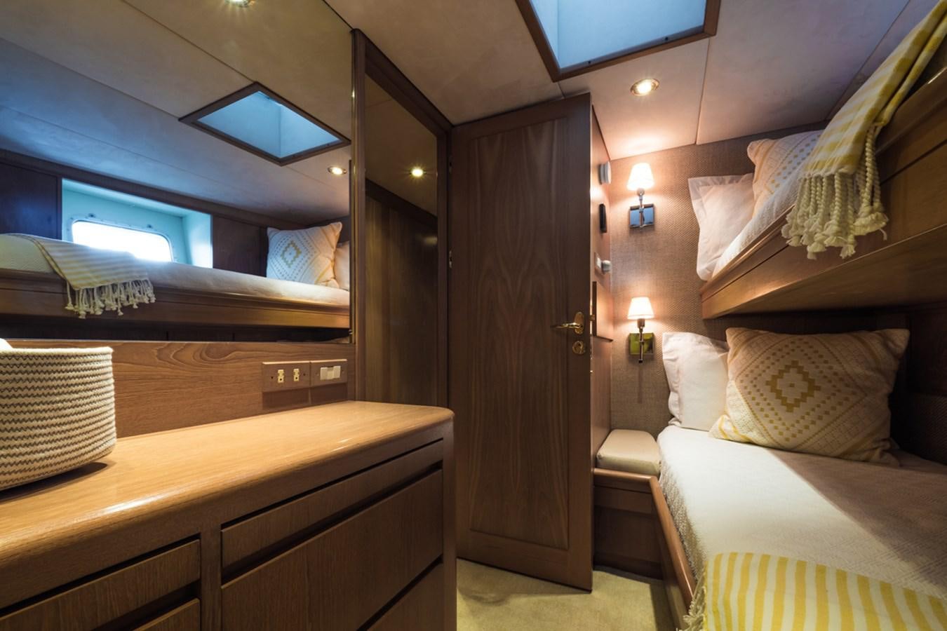 a room with a bed and a desk aboard THANKS BUDS Yacht for Sale