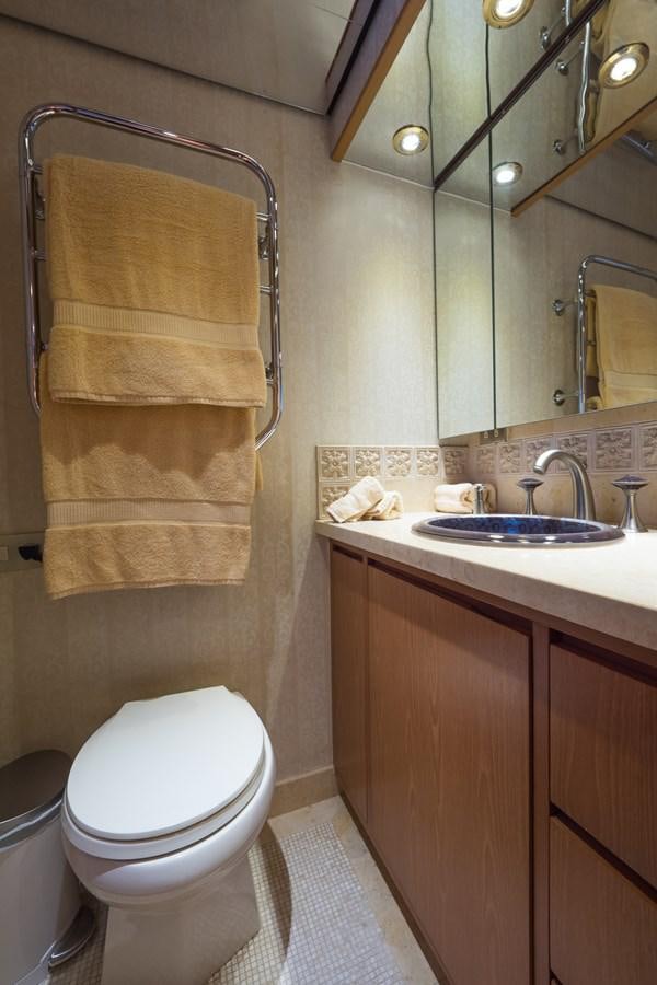 a bathroom with a toilet and a sink aboard THANKS BUDS Yacht for Sale