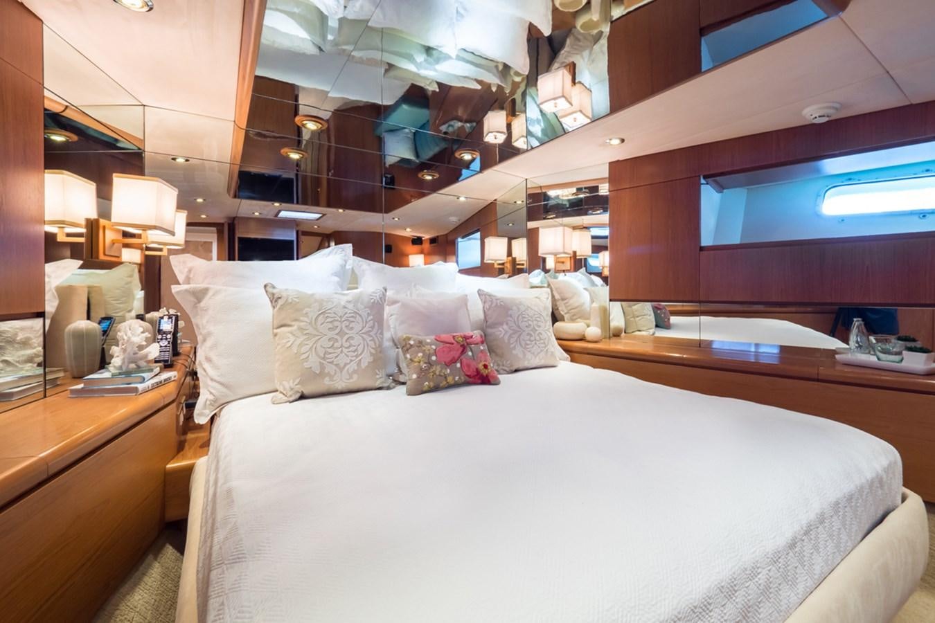 a room with a bed and a television aboard THANKS BUDS Yacht for Sale
