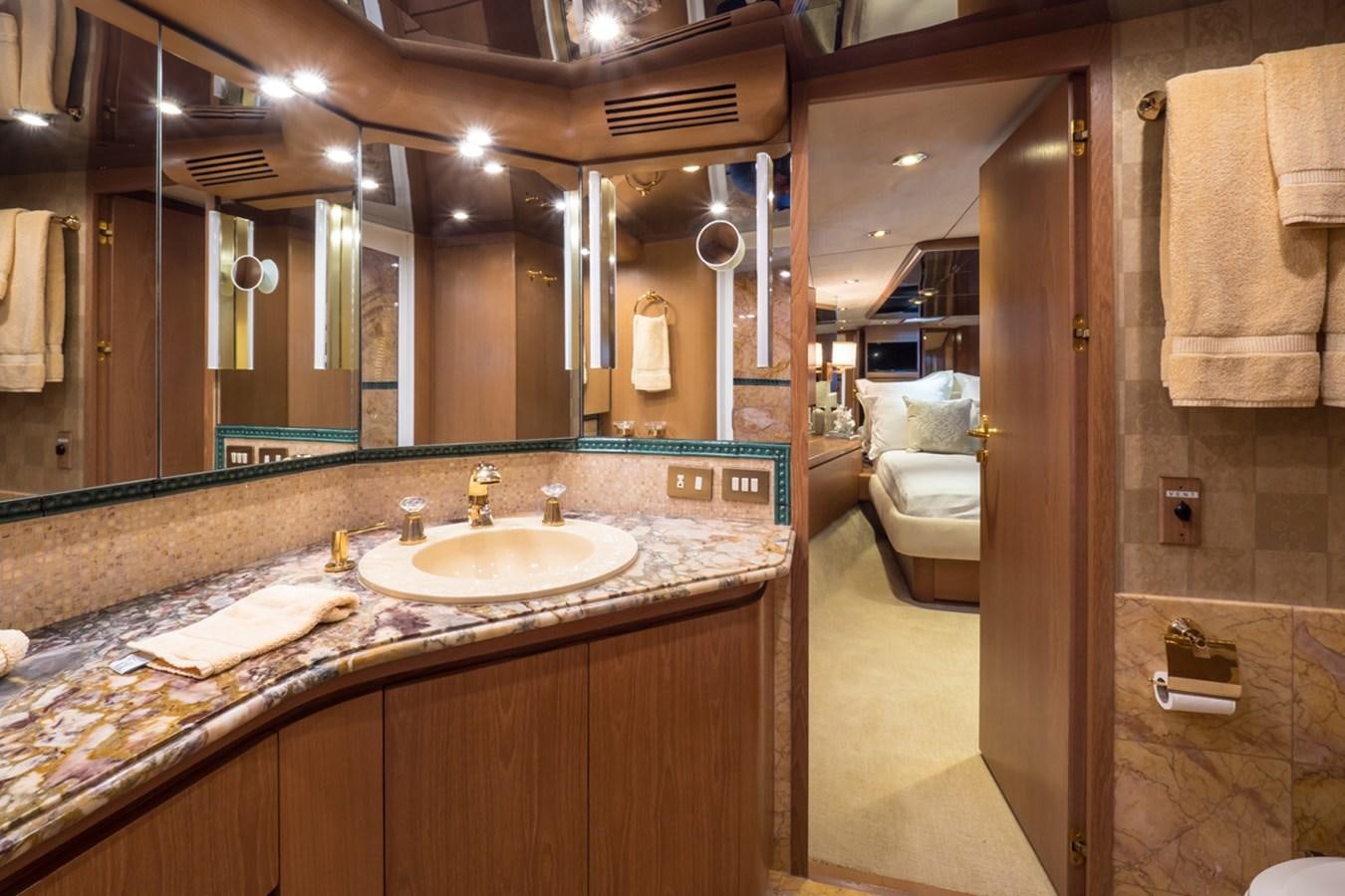 a bathroom with a countertop sink and a mirror aboard THANKS BUDS Yacht for Sale