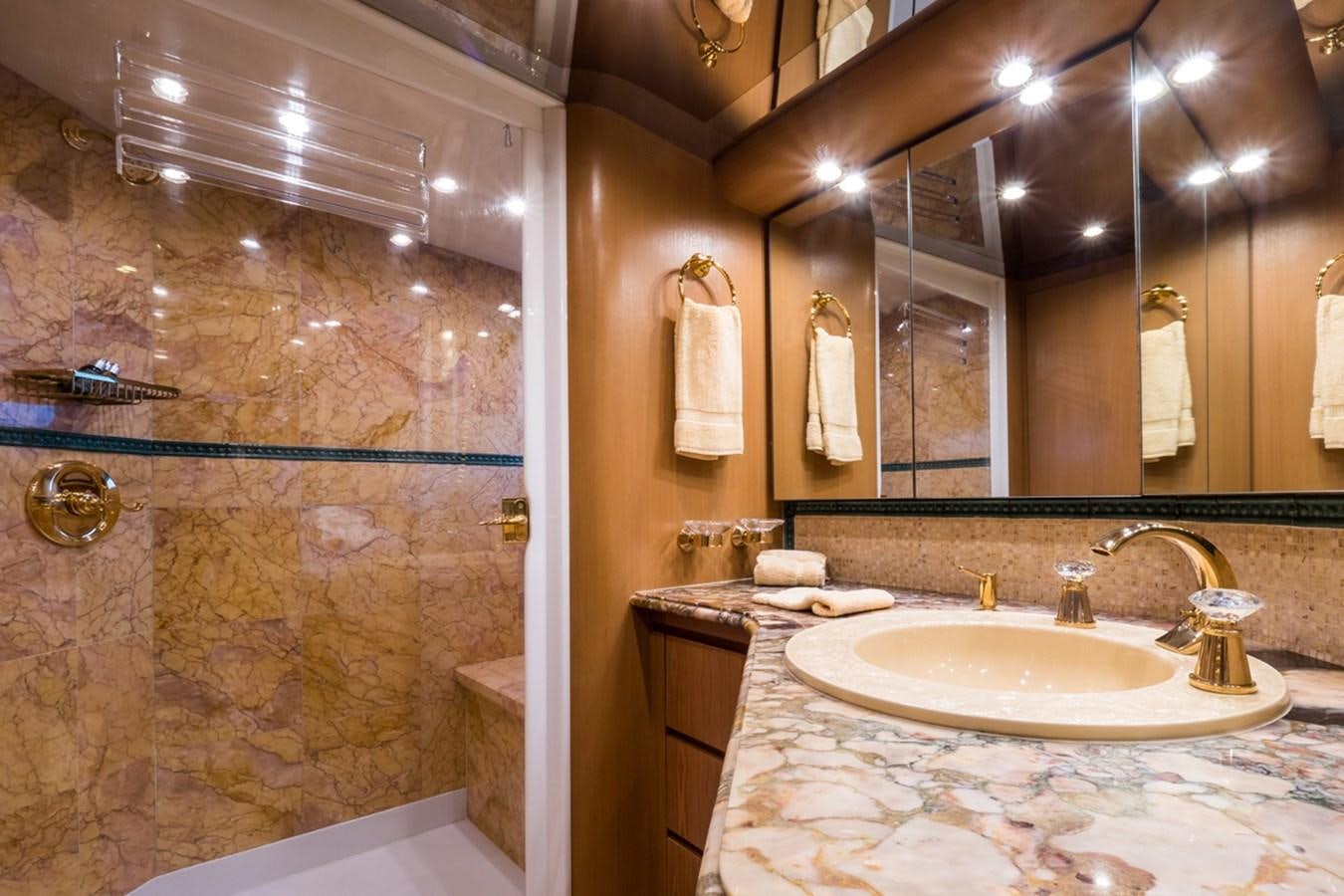 a bathroom with a large mirror aboard THANKS BUDS Yacht for Sale