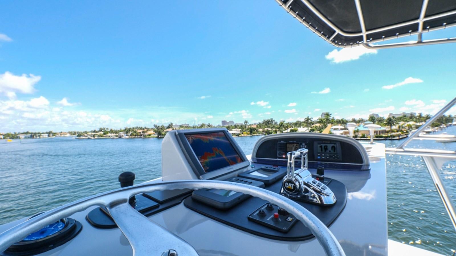 a boat with a view of a city and water aboard THANKS BUDS Yacht for Sale