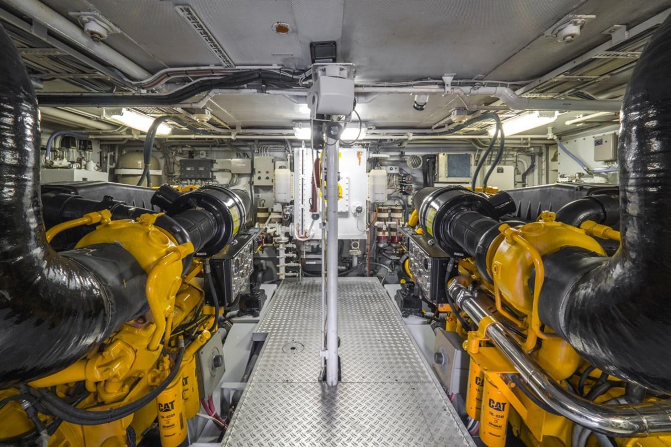 a large machine with yellow pipes aboard THANKS BUDS Yacht for Sale