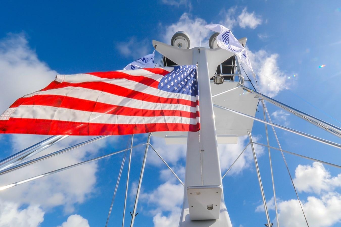 a flag on a pole aboard THANKS BUDS Yacht for Sale