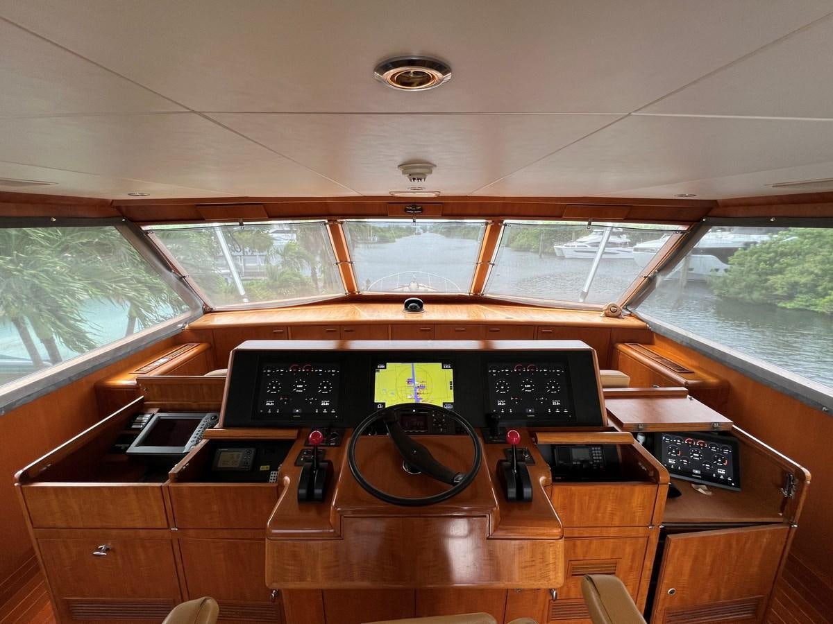 a desk with electronic devices aboard THANKS BUDS Yacht for Sale