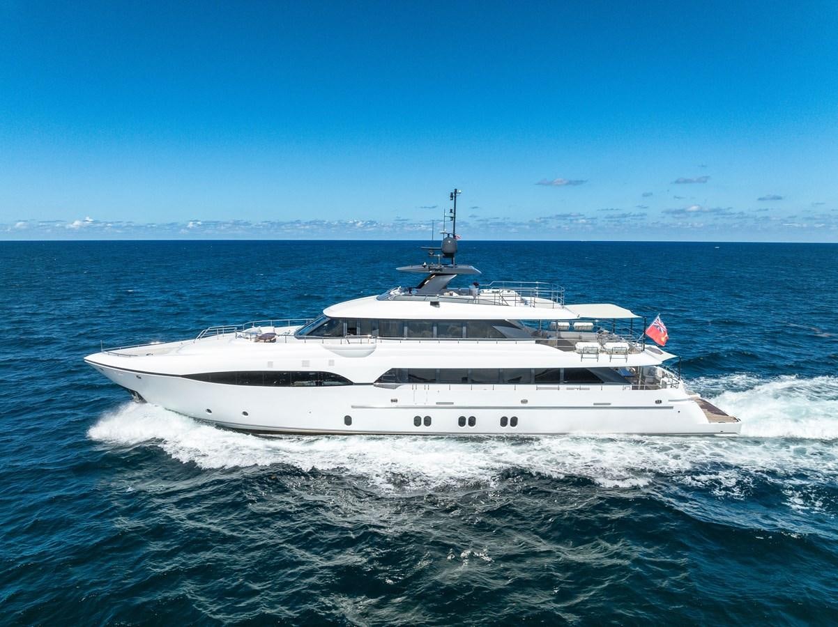 a white yacht in the ocean aboard FAMILYBILT Yacht for Sale