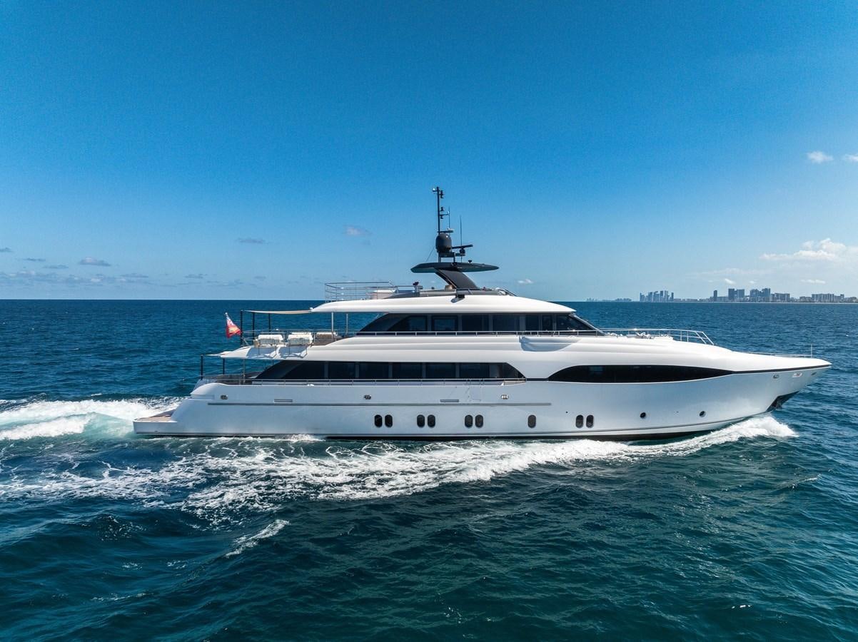 a white yacht in the water aboard FAMILYBILT Yacht for Sale