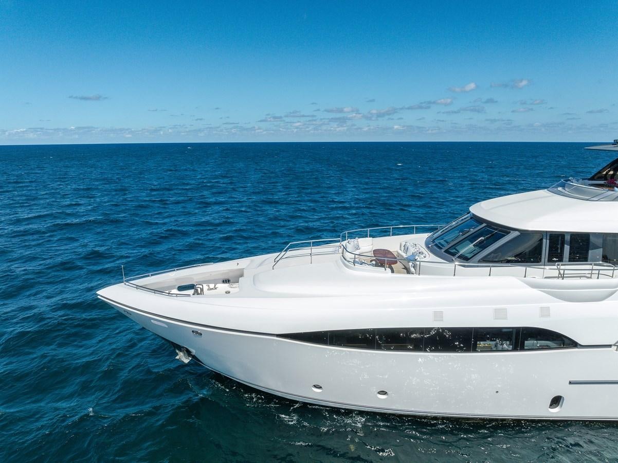 a white yacht in the water aboard FAMILYBILT Yacht for Sale