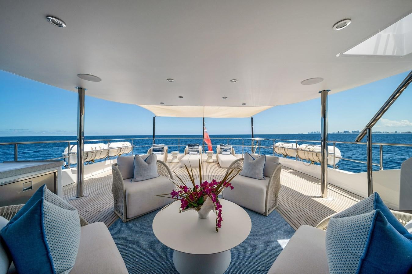 a large living room with a large body of water aboard FAMILYBILT Yacht for Sale