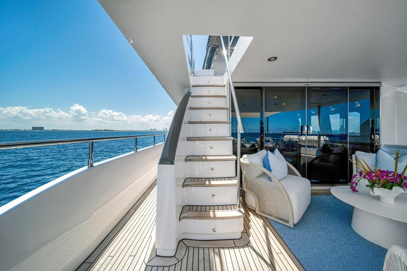 a balcony overlooking the ocean aboard FAMILYBILT Yacht for Sale