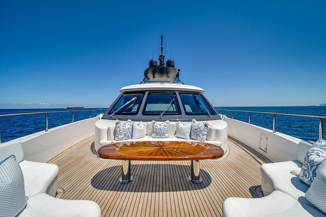 a white car on a wooden platform aboard FAMILYBILT Yacht for Sale