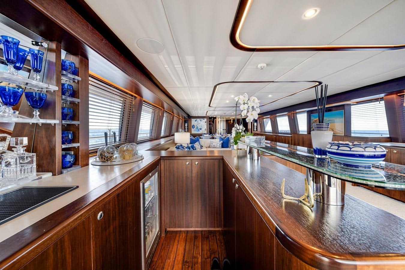 a kitchen with a large island aboard FAMILYBILT Yacht for Sale
