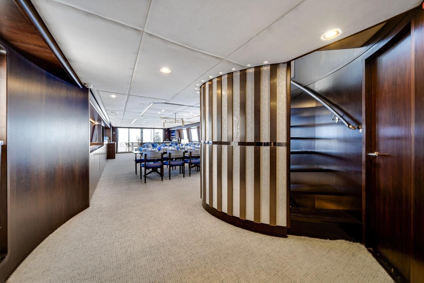 a room with a large mirror aboard FAMILYBILT Yacht for Sale