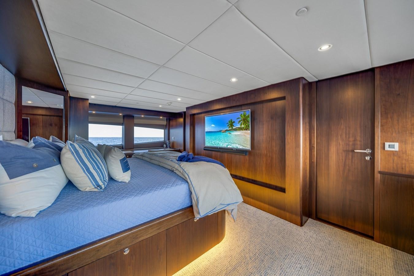 a room with two beds aboard FAMILYBILT Yacht for Sale