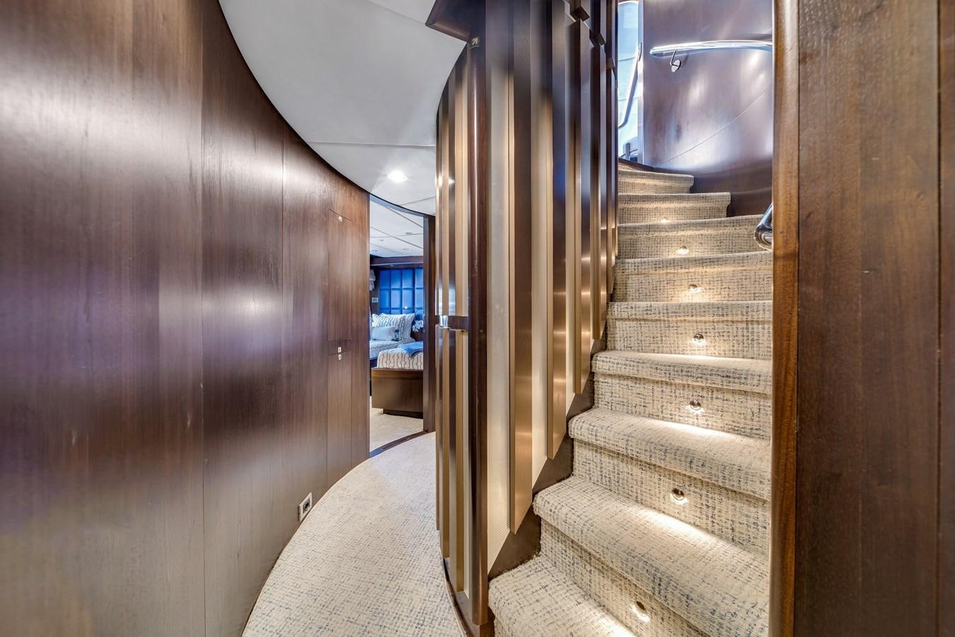 a hallway with wooden walls aboard FAMILYBILT Yacht for Sale