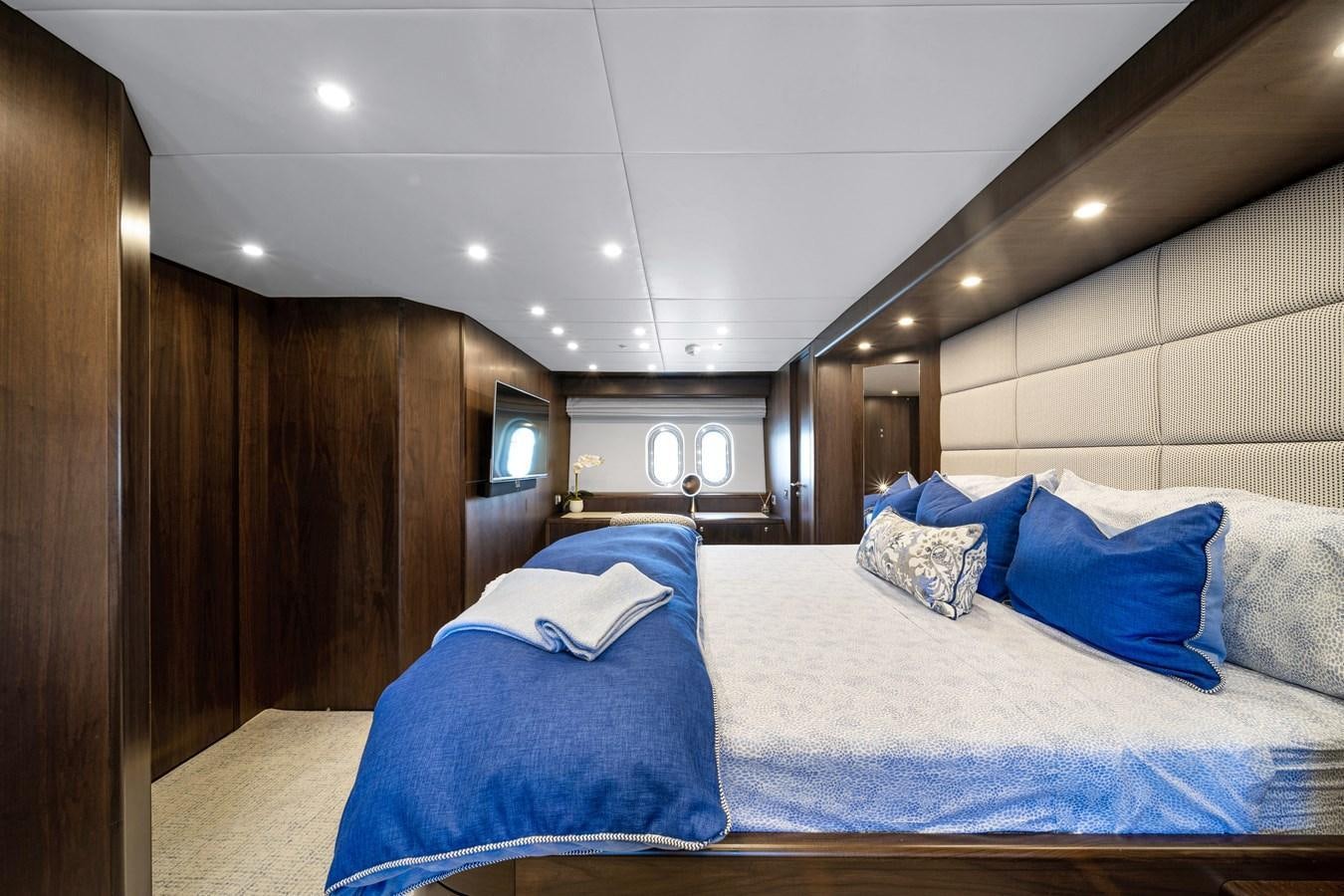 a room with two beds aboard FAMILYBILT Yacht for Sale
