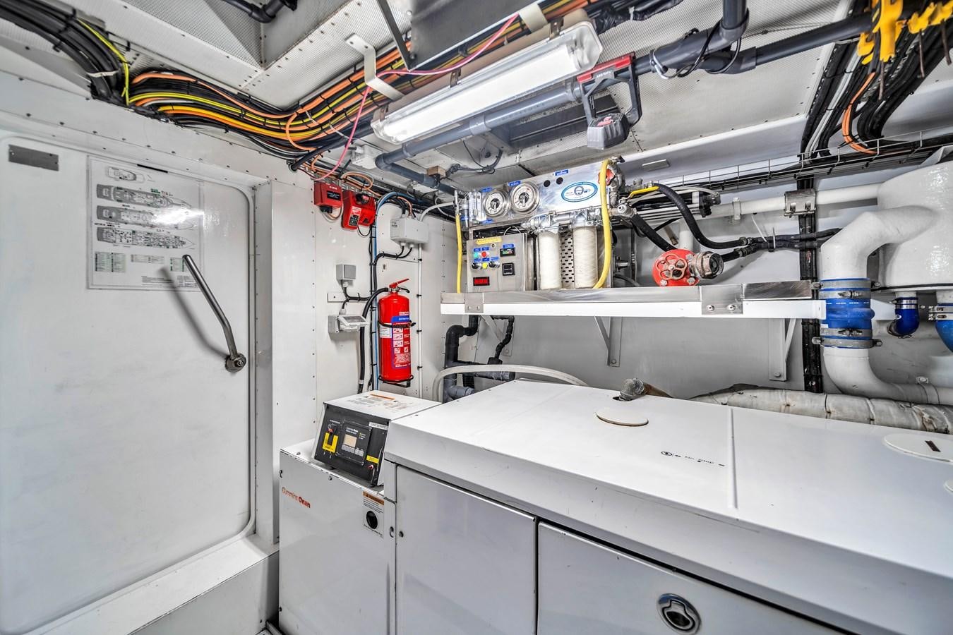 a white machine with wires aboard FAMILYBILT Yacht for Sale