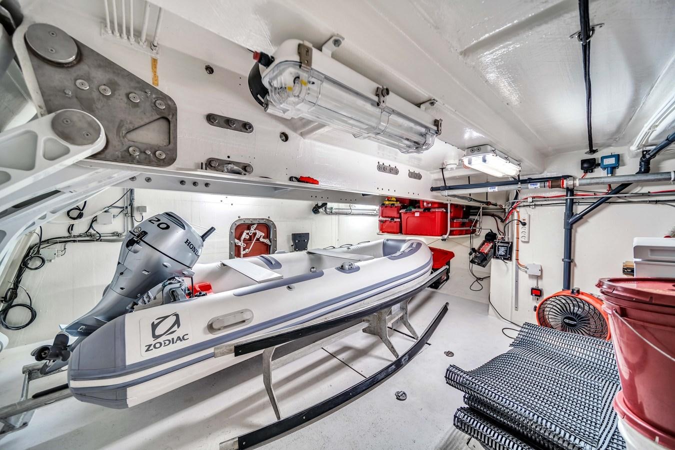 a machine with a large metal object aboard FAMILYBILT Yacht for Sale