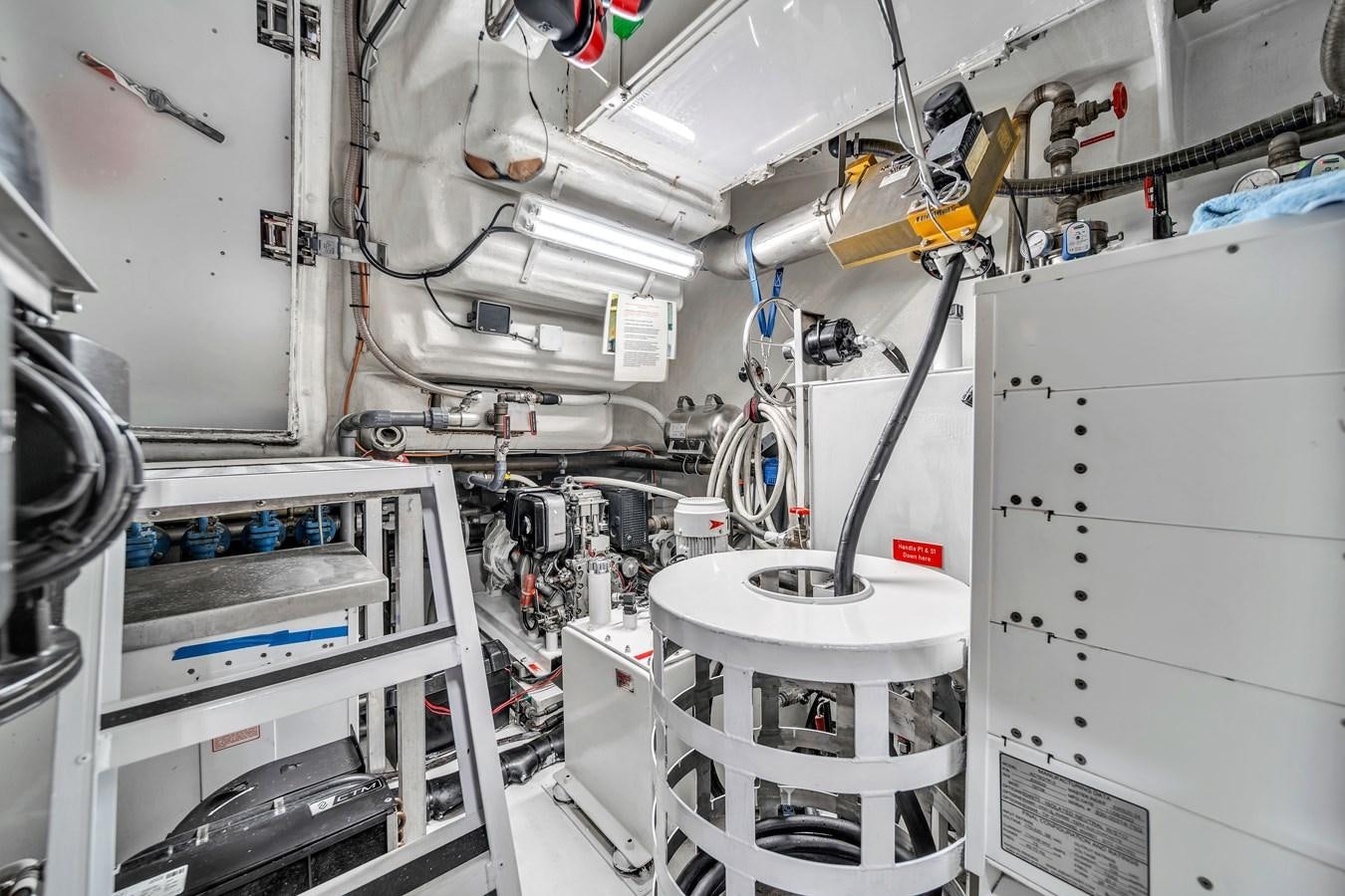 a white machine with a light aboard FAMILYBILT Yacht for Sale