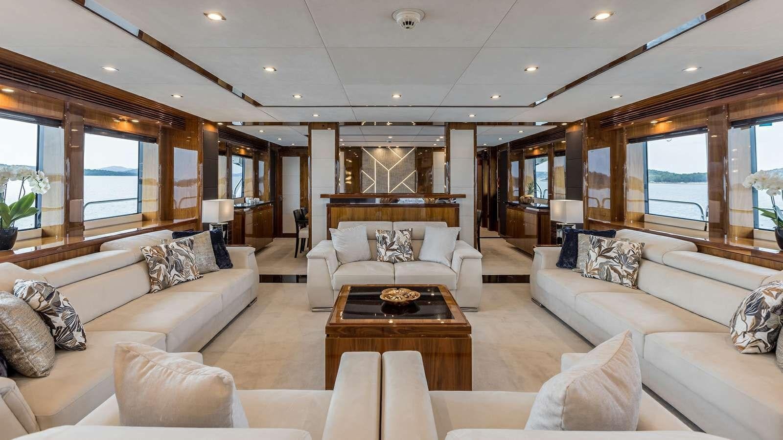 a living room with a large window aboard KATARIINA I Yacht for Sale