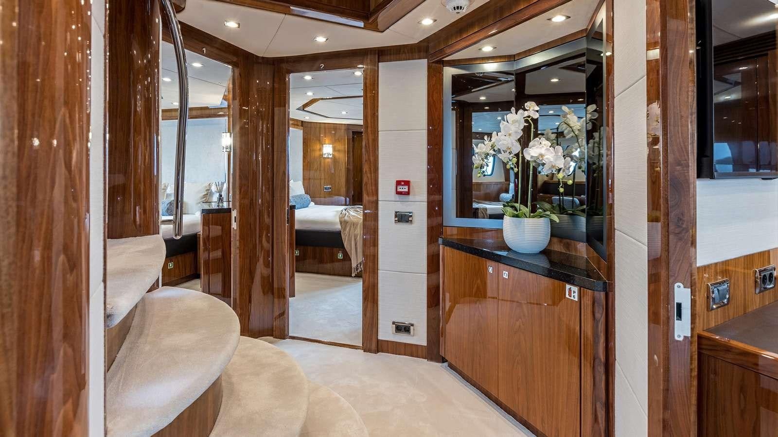 a room with a large mirror and a bed aboard KATARIINA I Yacht for Sale