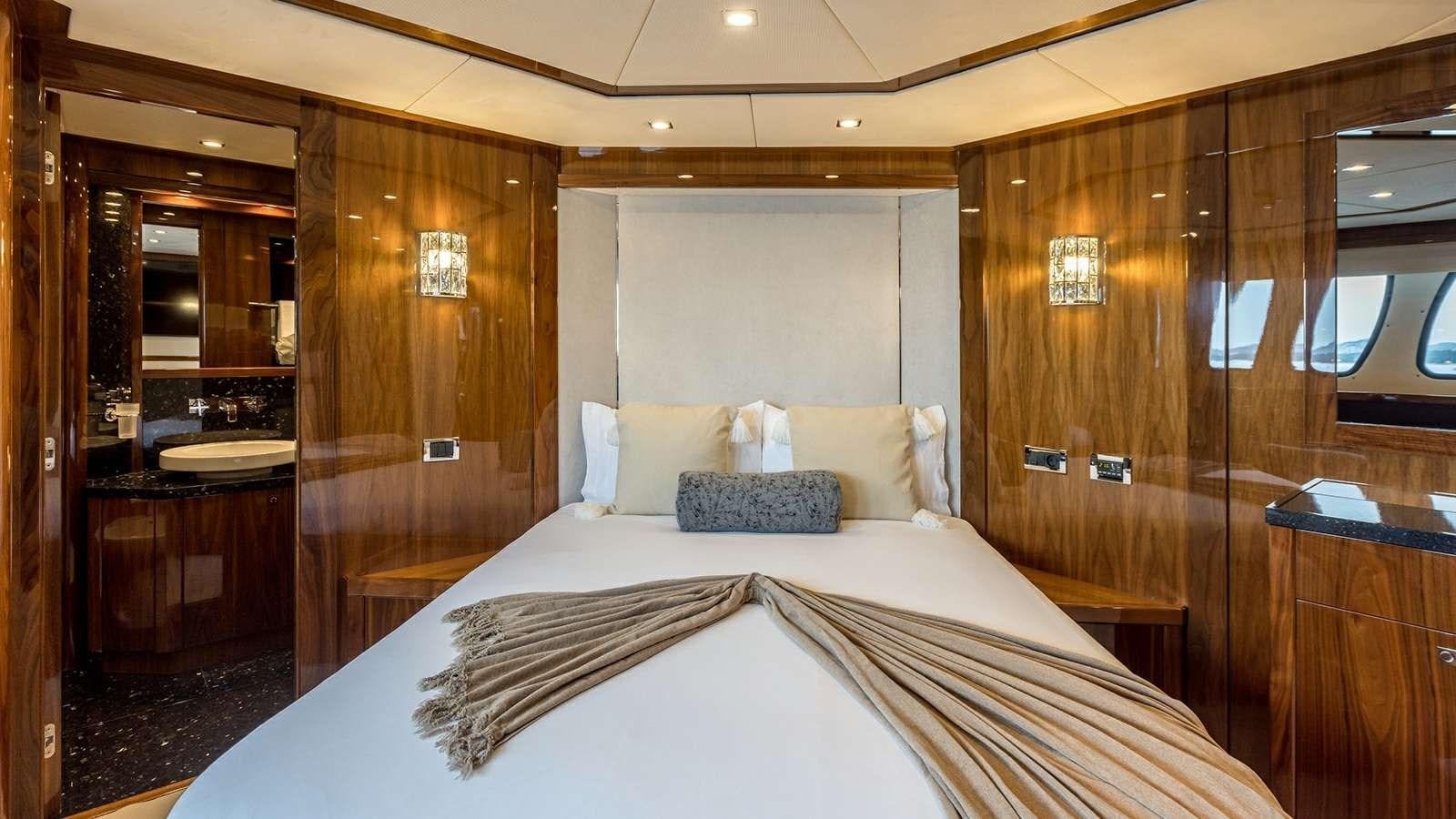 a large bed in a room aboard KATARIINA I Yacht for Sale