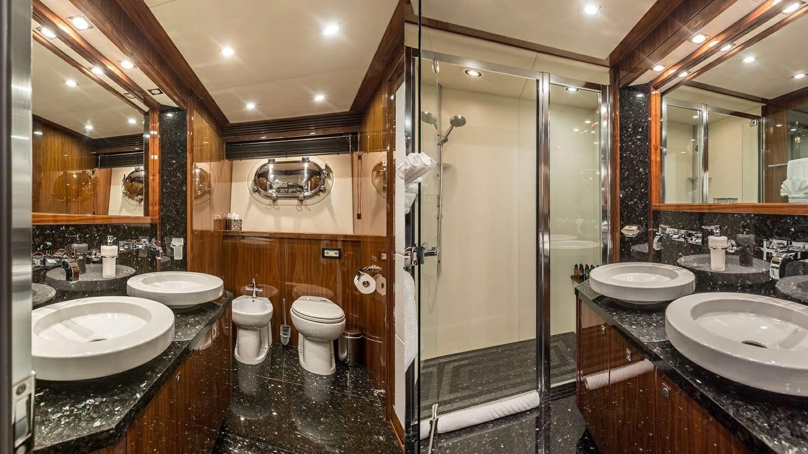 a bathroom with a stand up shower aboard KATARIINA I Yacht for Sale