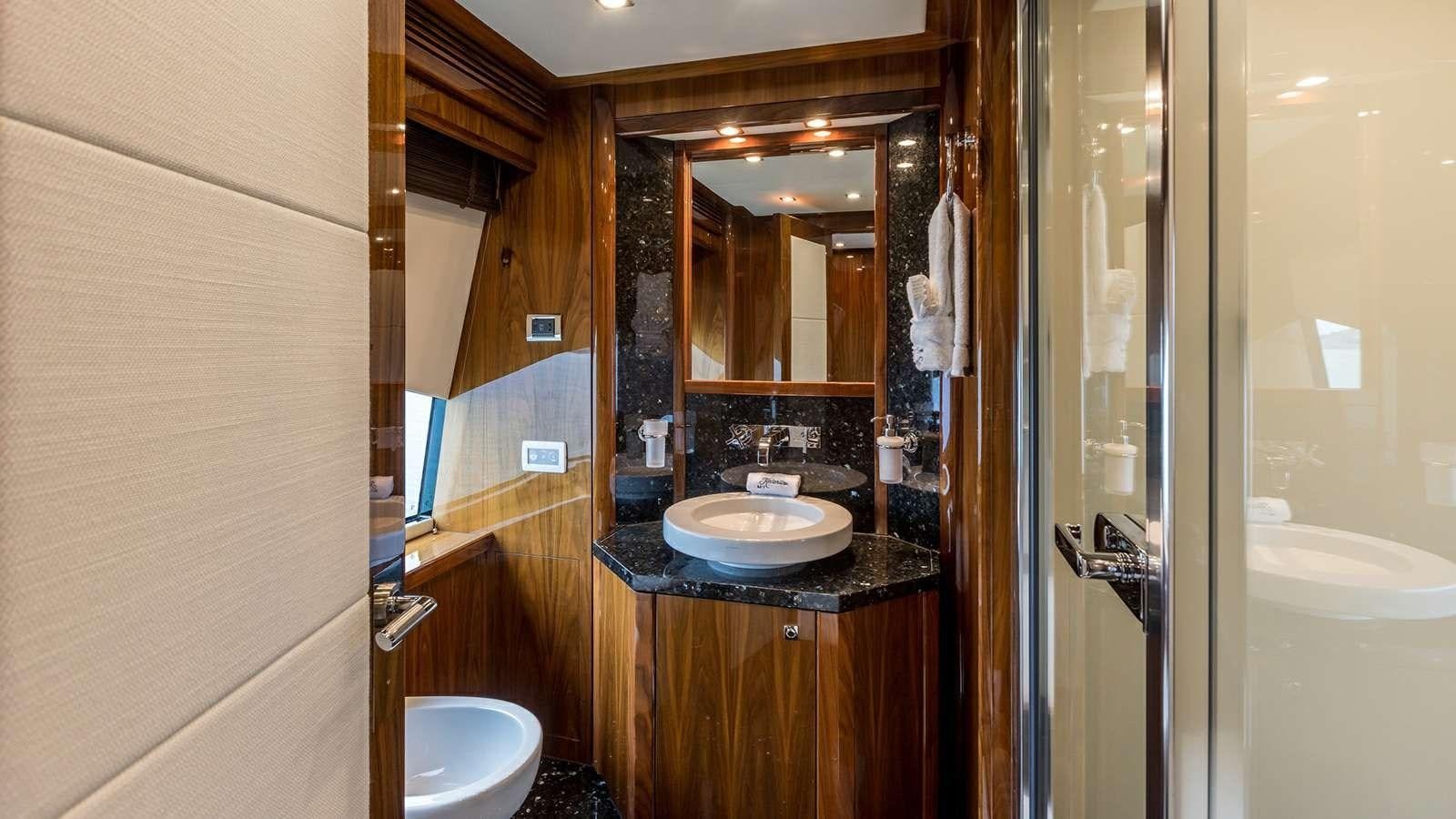a bathroom with a sink and a mirror aboard KATARIINA I Yacht for Sale