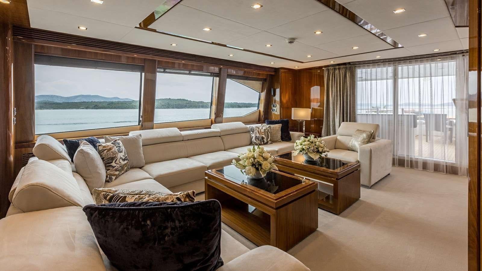 a living room with a large window aboard KATARIINA I Yacht for Sale