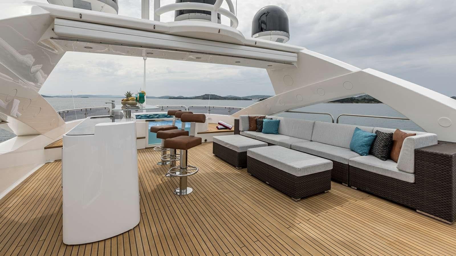 a room with a couch and a table aboard KATARIINA I Yacht for Sale