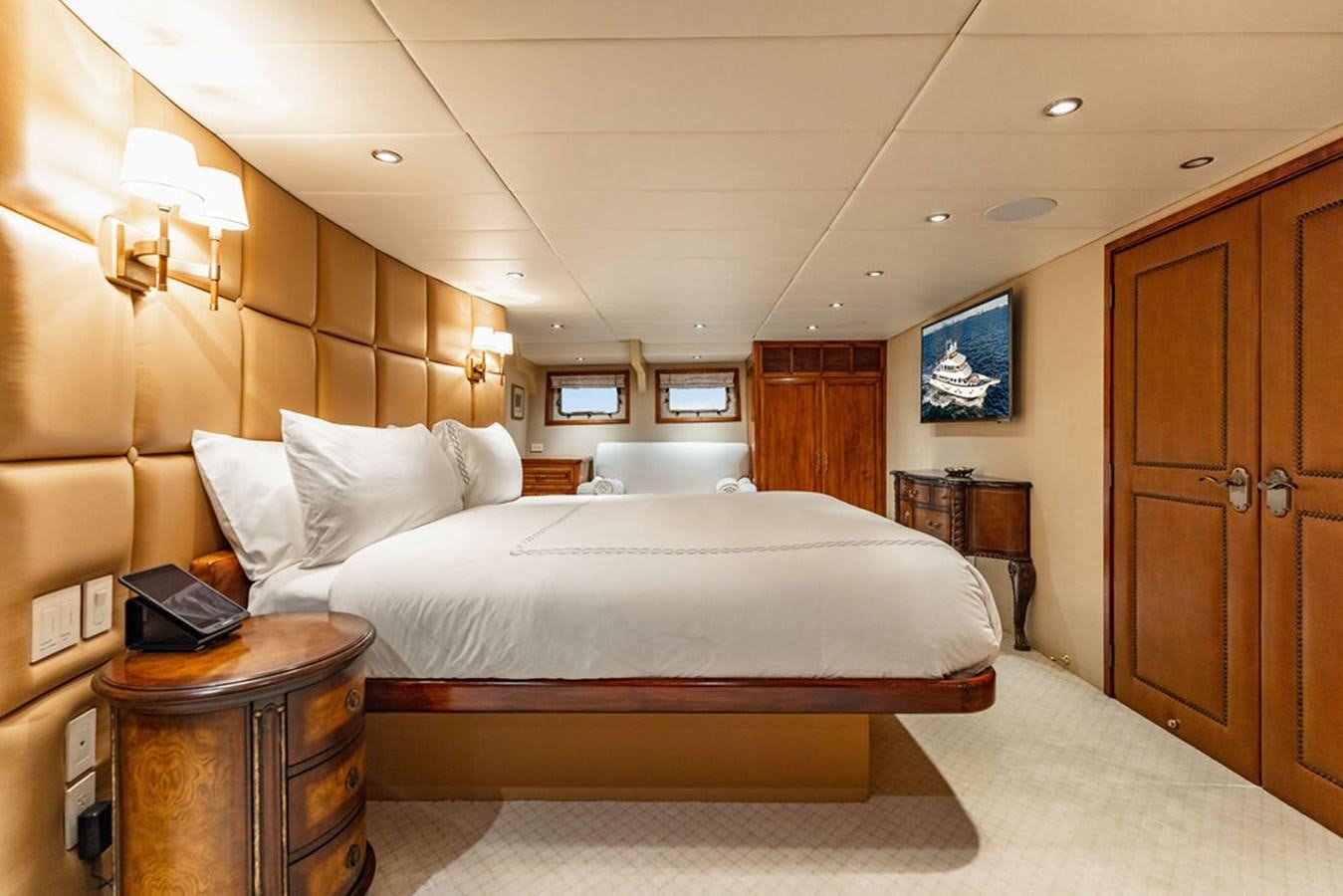a hotel room with a bed aboard EMPIRE SEA Yacht for Sale