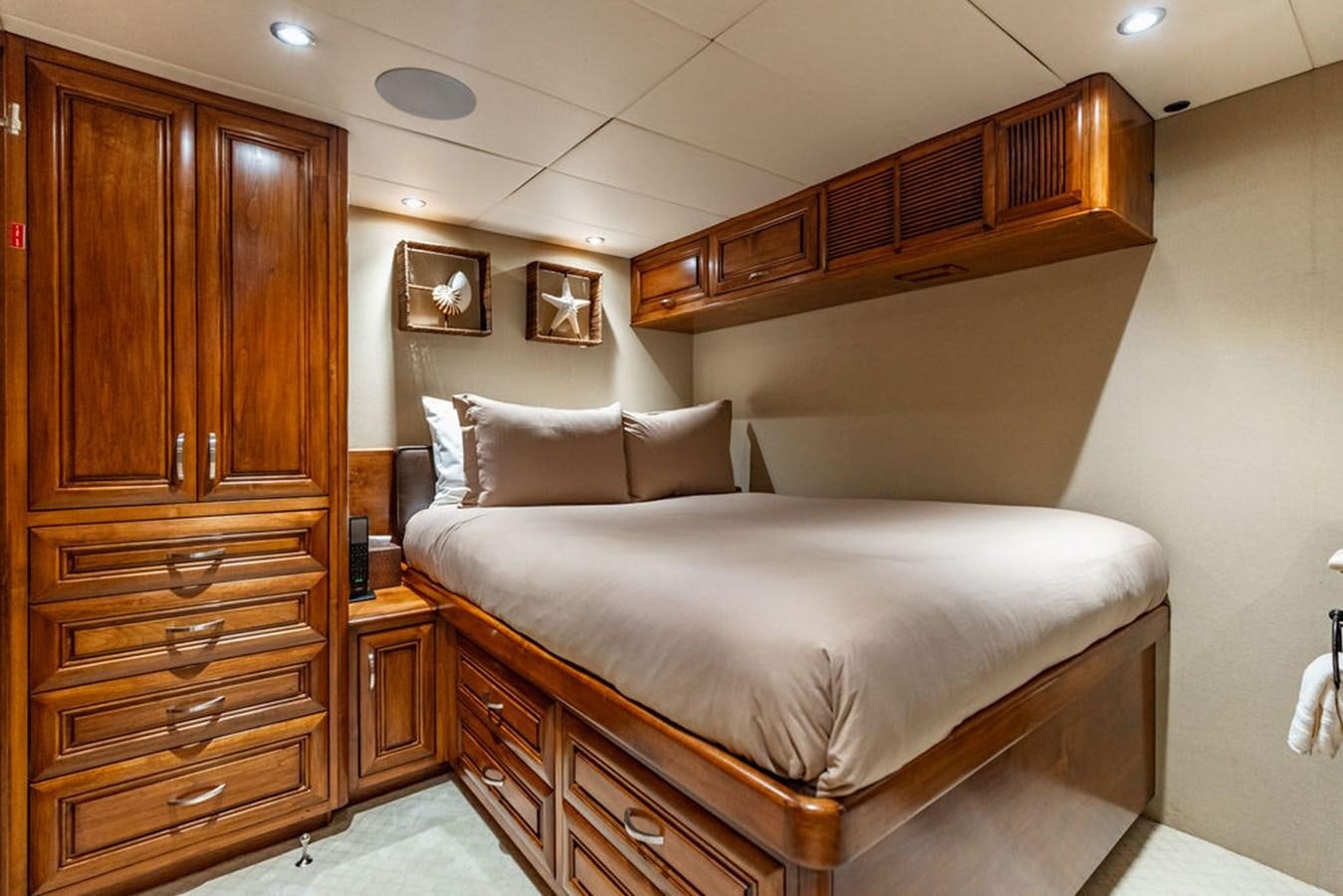 a bed in a room aboard EMPIRE SEA Yacht for Sale