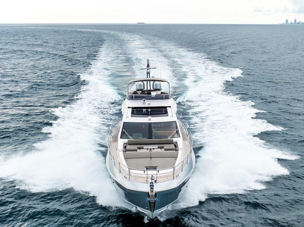 a boat on the water aboard JUST KEEP LIVIN Yacht for Sale