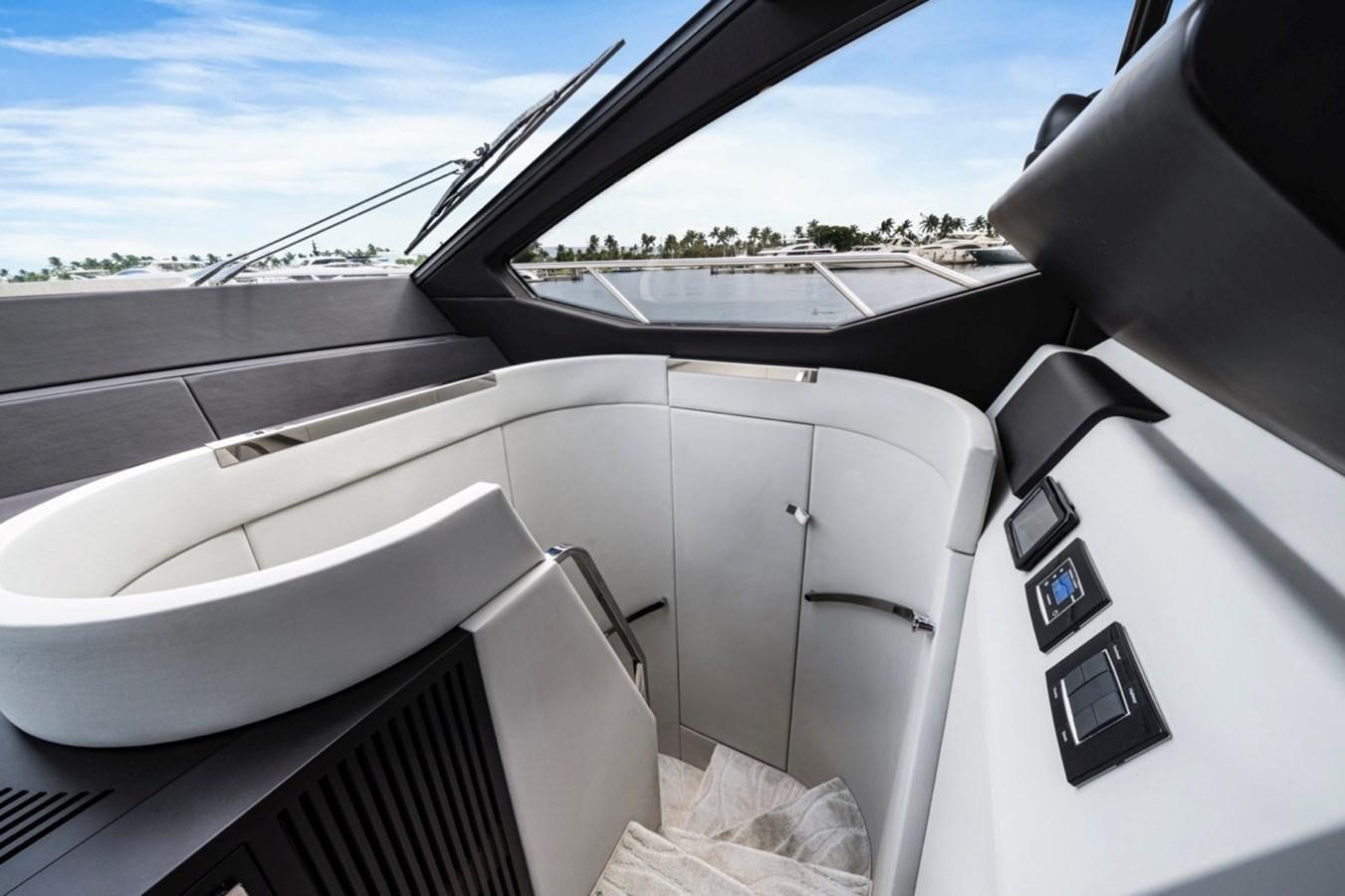 the inside of a car aboard JUST KEEP LIVIN Yacht for Sale