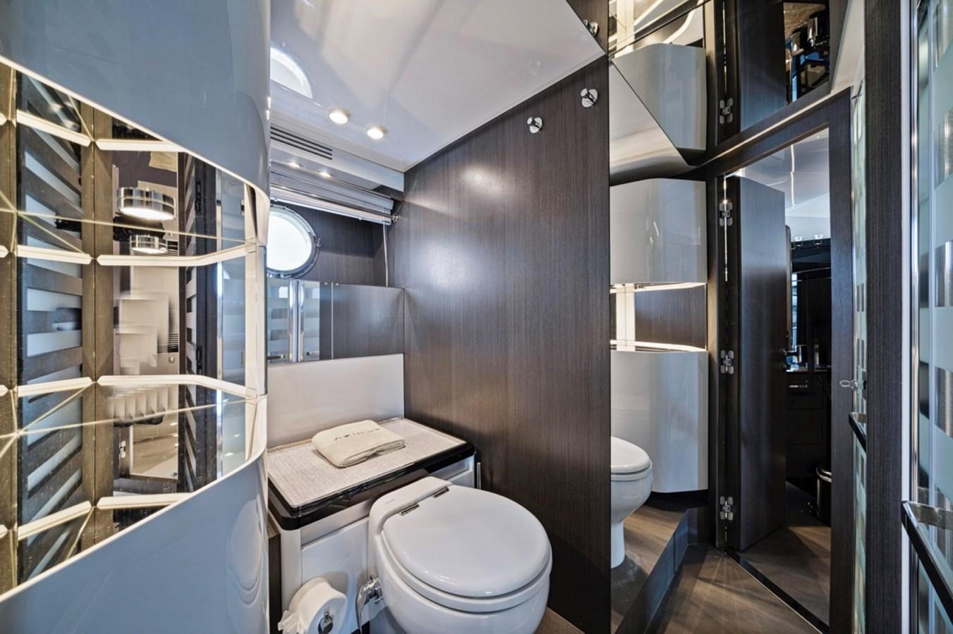 a bathroom with a toilet and a sink aboard JUST KEEP LIVIN Yacht for Sale