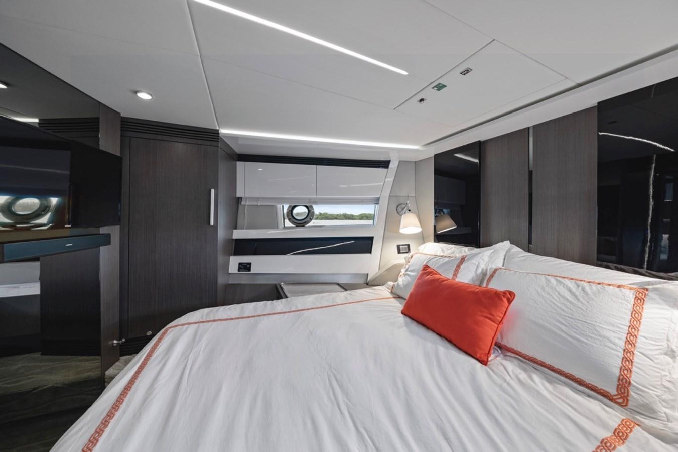 a large bed in a room aboard JUST KEEP LIVIN Yacht for Sale