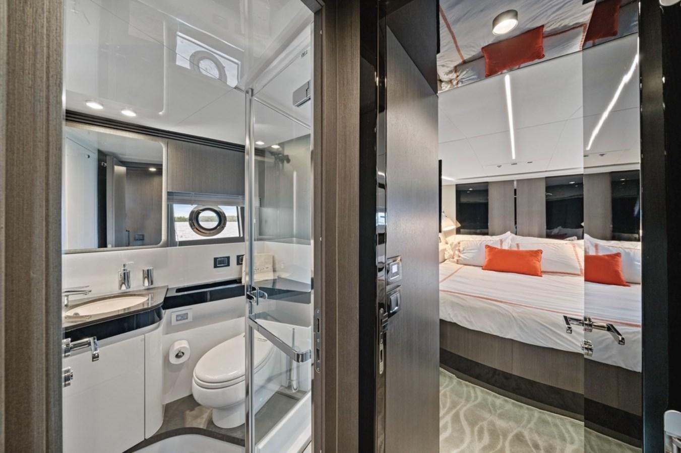 a bathroom with a glass shower aboard JUST KEEP LIVIN Yacht for Sale