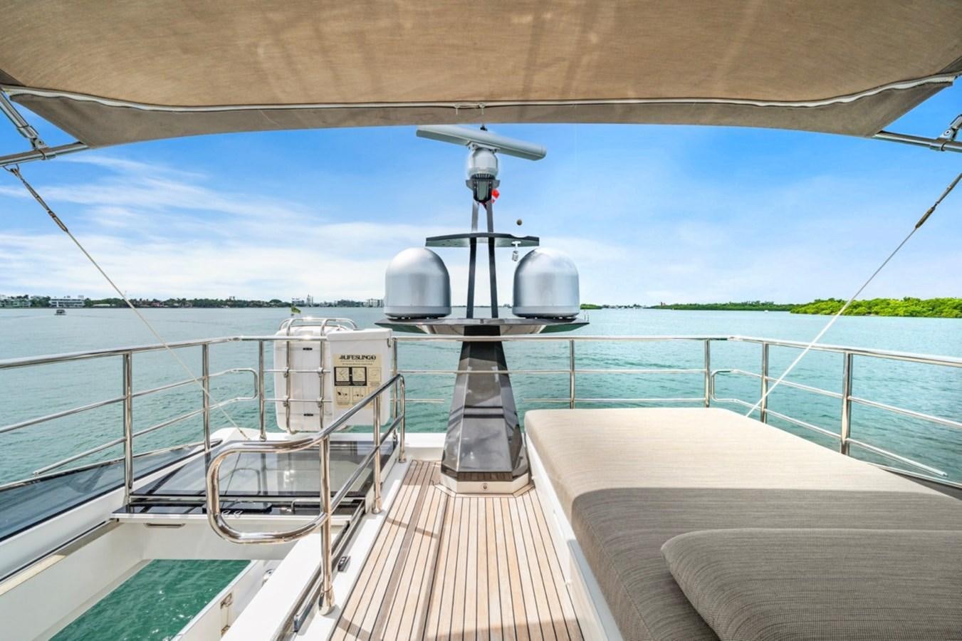 a boat on the water aboard JUST KEEP LIVIN Yacht for Sale